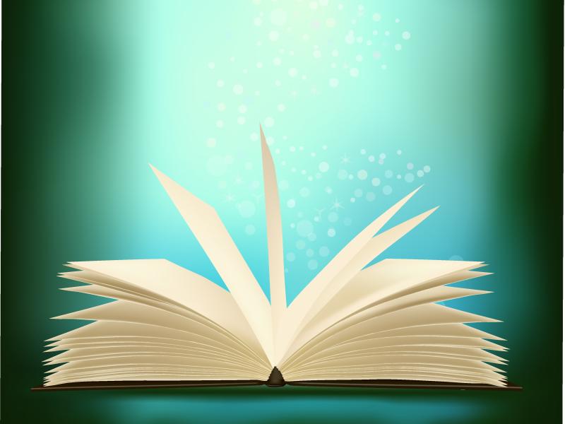 En opslået bog der udstråler grønt lys